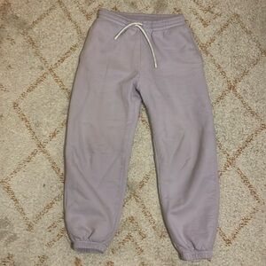 THE ARRIVALS 

Men’s Medium Light Purple Sweatpants 
Used/Good condition